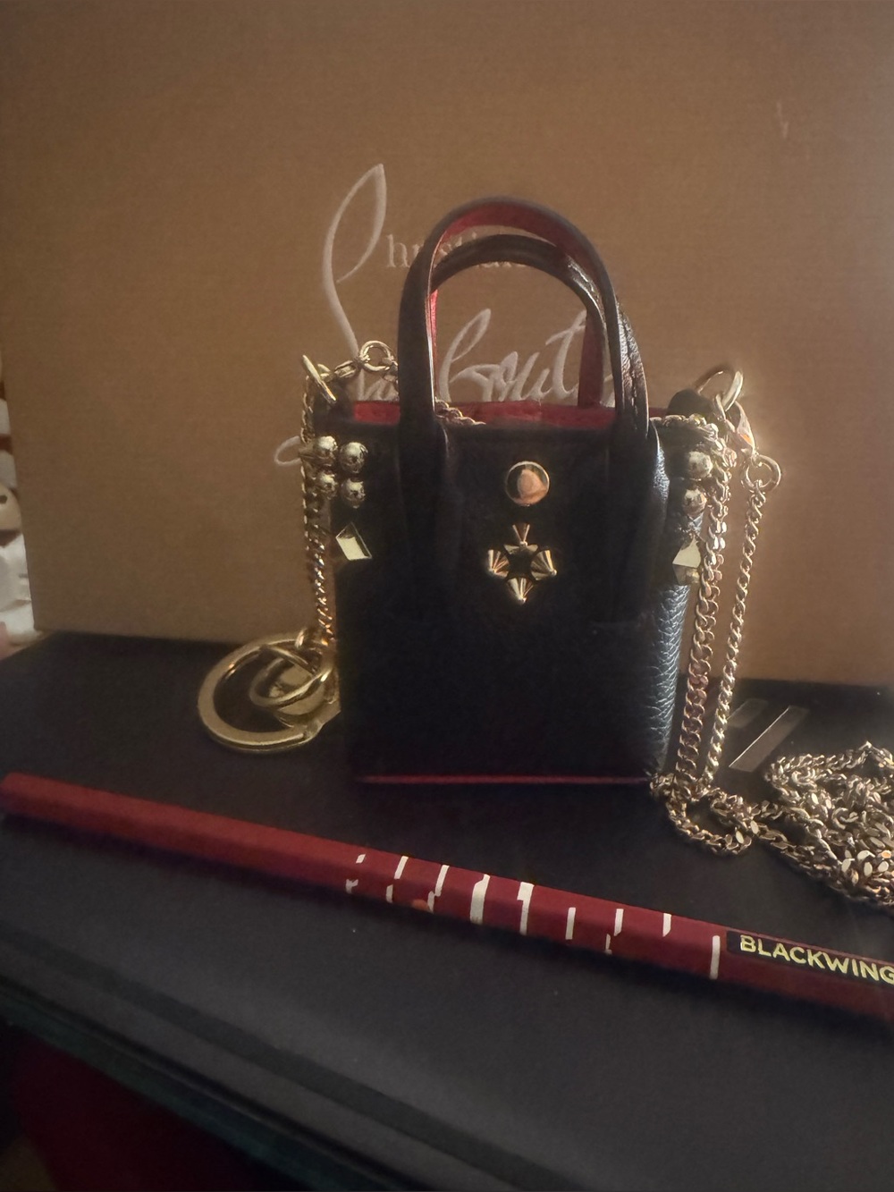 CHRISTIAN LOUBOUTIN CABATA MICRO SPIKE LEATHER LIPSTICK or AIRPODS BAG